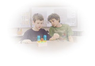 Children playing with coding bricks